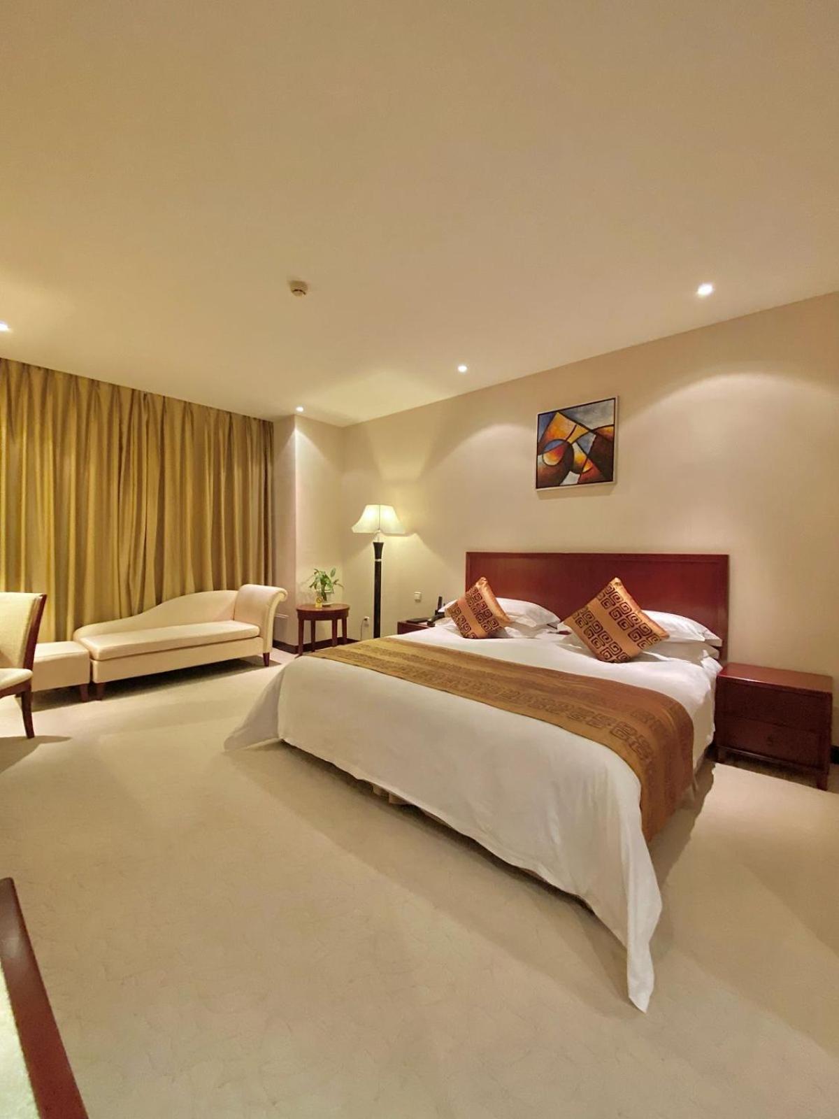 Beijing Palace Soluxe Hotel Astana Εξωτερικό φωτογραφία A bedroom at the hotel