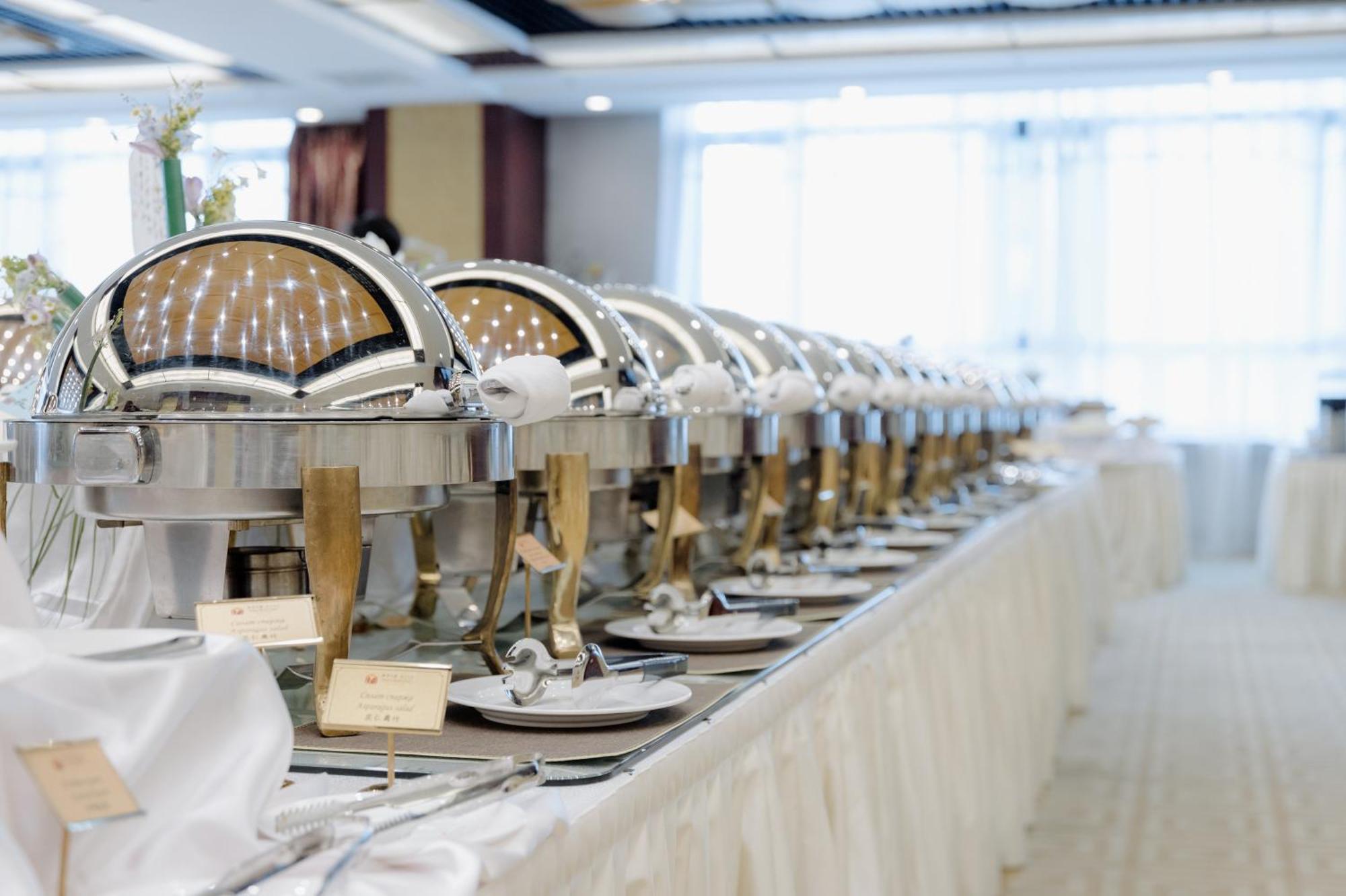 Beijing Palace Soluxe Hotel Astana Εξωτερικό φωτογραφία A row of chafing dishes